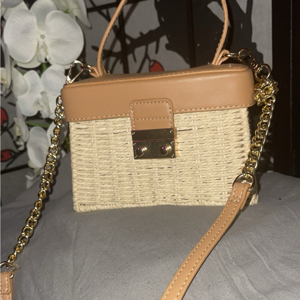 Cute bag, worn a few times. Still sturdy & cute